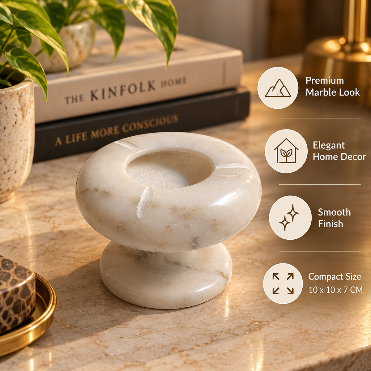 White marble ashtray with natural grey veins
Smooth polished finish across the round surface
Deep central bowl with three cigarette rests
Handcrafted marble piece with a pedestal base
Contemporary design for coffee tables and bar carts
Compact marble accessory for indoor spaces
Uphar Handicrafts