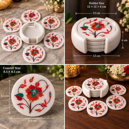 White marble coasters with floral inlay
Set of 6 round coasters with holder
Decorative floral vine pattern
Polished marble surface
Traditional Indian-inspired table accessory
Handcrafted marble coaster set
Uphar Handicrafts