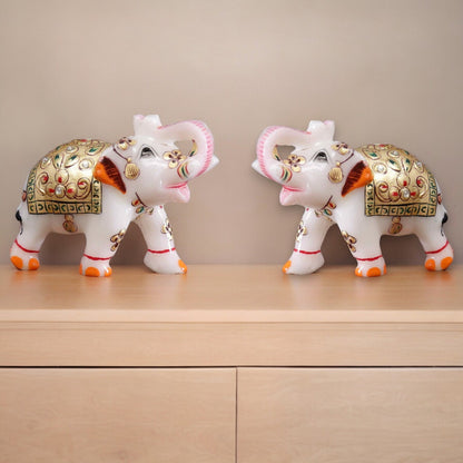 White Marble Meenakari Elephant Statues
Set of 2 Handcrafted Elephant Figurines
Colorful Meenakari Work on White Marble
Skilled Indian Artisan Crafted Design
Pooja Room and Home Temple Decoration
Living Room Shelf and Tabletop Decor
Uphar Handicrafts