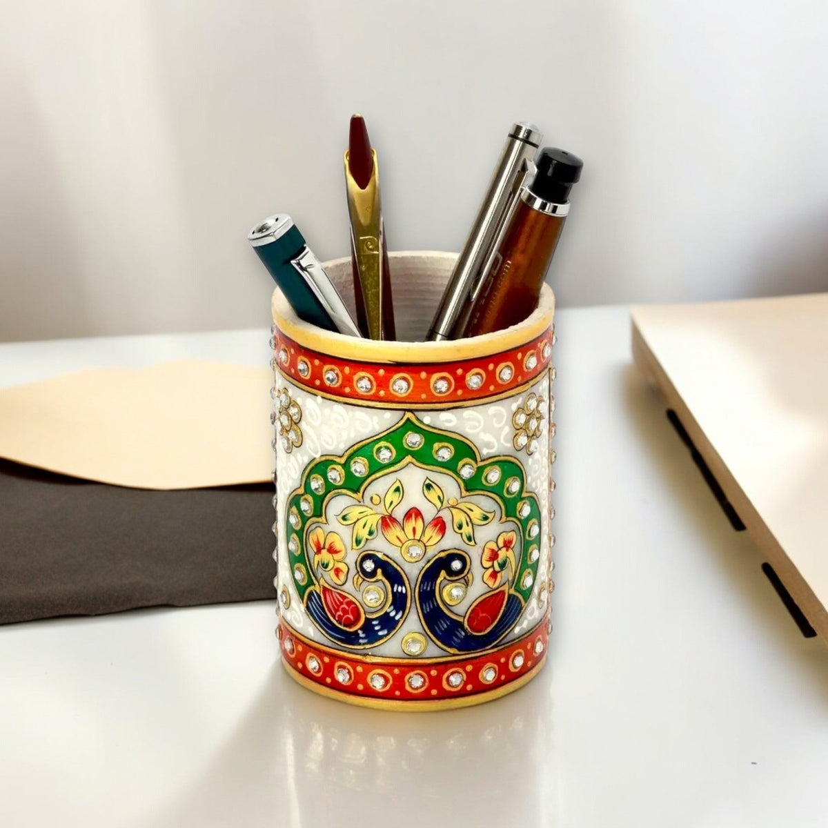 White Marble Meenakari Peacock Pen Holder
Gold Mayur Design Decorative Stand
Traditional Indian Handcrafted Artwork
Elegant Marble Desk Accessory
Pen and Pencil Organizer for Office
Indian Ethnic Tabletop Decor
Uphar Handicrafts