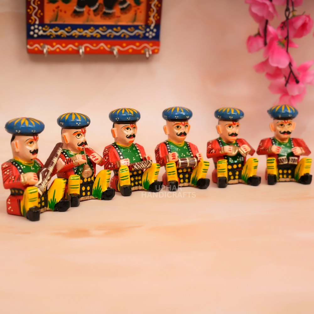 Wooden Indian Musician Figurines
Set of 6 Handcrafted Music Players
Vibrant Multicolor Wooden Decor
Traditional Guitar Flute and Drum Figures
Living Room and Music Studio Decor
Unique Handmade Gift for Music Lovers
Uphar Handicrafts