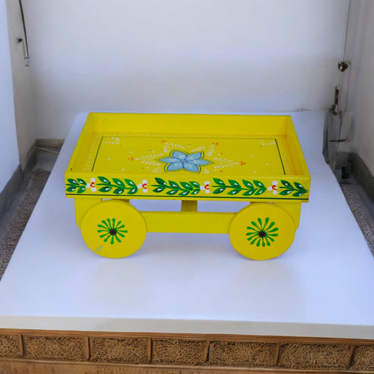 Yellow Wooden Thela Serving Tray
Traditional Indian Street Cart Design
Hand-Painted Wooden Serving Trolley
Decorative Tray
Serving Snacks Sweets and Dry Fruits
Diwali Wedding and Housewarming Gift
Uphar Handicrafts